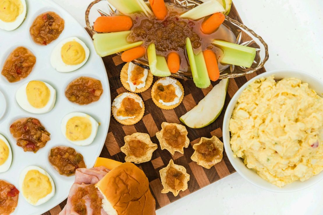 Relish served with deviled eggs and snacks